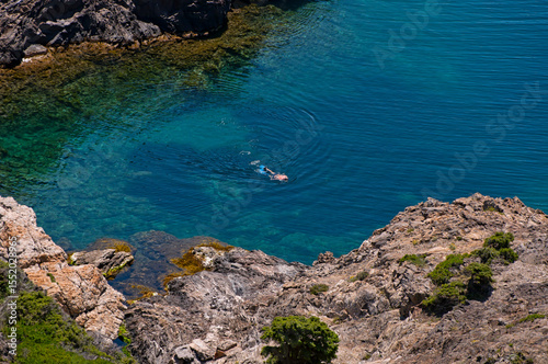 Swimmer in a hidden cove