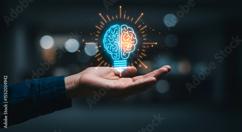Creative Idea Concept: Brain Light Bulb on Hand