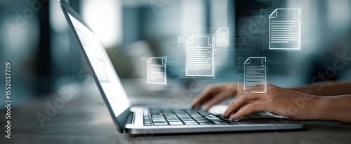 The laptop displaying digital documents during productive workspace activity.