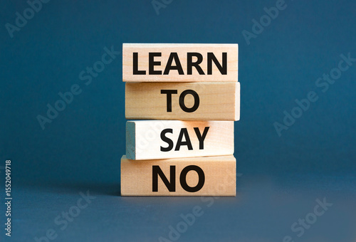 Learn to say no symbol. Concept words phrase Learn to say no on beautiful wooden blocks. Beautiful grey paper background. Business psychological Learn to say no concept. Copy space.