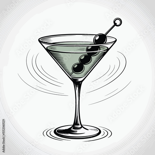 Classic martini cocktail with olives on a pick in a glass with swirling lines