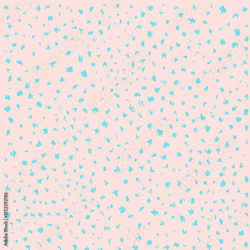 Light pink background scattered with small, irregular blue shapes, creating a playful, abstract pattern.
