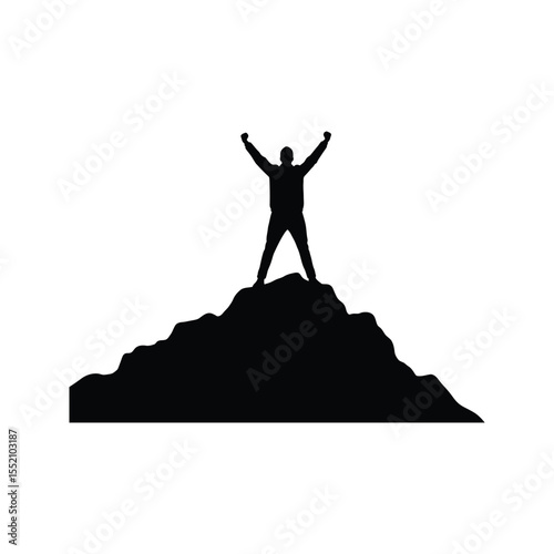 Silhouette of a Man Triumphantly Standing on a Mountain Peak Achieving Success