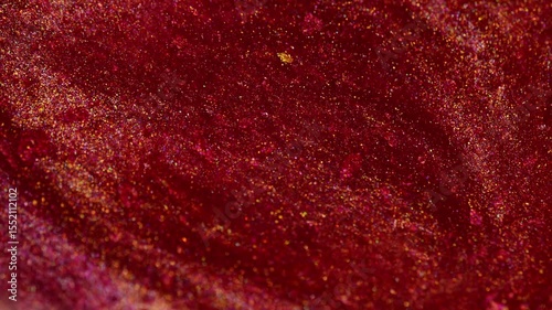 Swirling dark red abstract pigment background