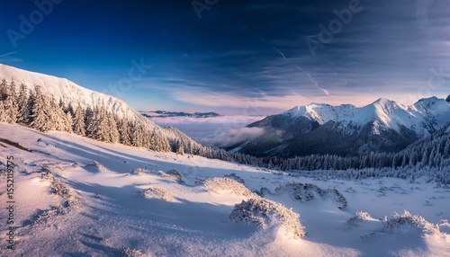 high tatras mountains snowy in winter with beautiful hills below them slovakia velky choc 12 1 2020