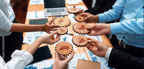 Photography A vibrant business scene showcasing hands holding wooden gears, symbolizing teamwork and collaborative strategy in a modern office environment