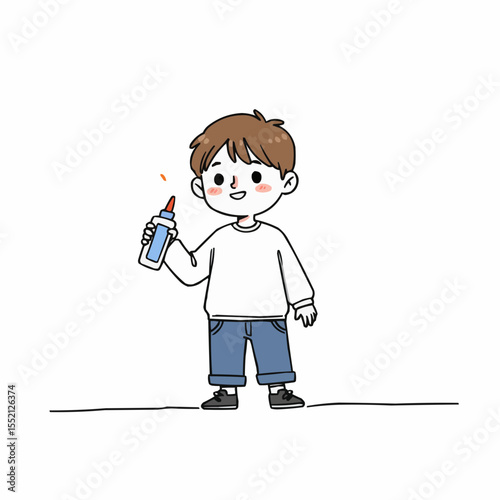 Young boy smiling while holding a glue stick in casual clothing  