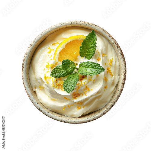 Creamy dessert with lemon slice and mint leaves garnished with zest in a rustic bowl isolated on transparent background