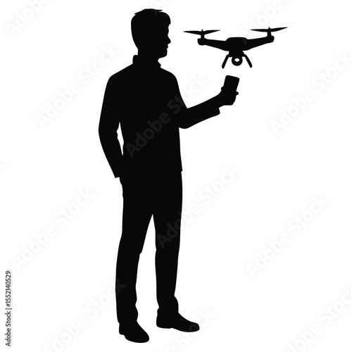 Man holding smartphone controlling drone silhouette