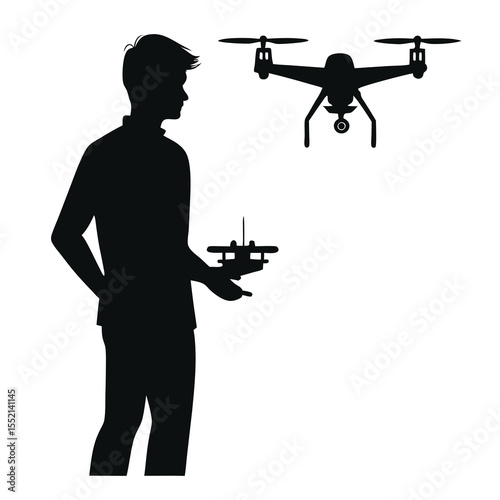Silhouette of a man holding a drone controller with a drone flying