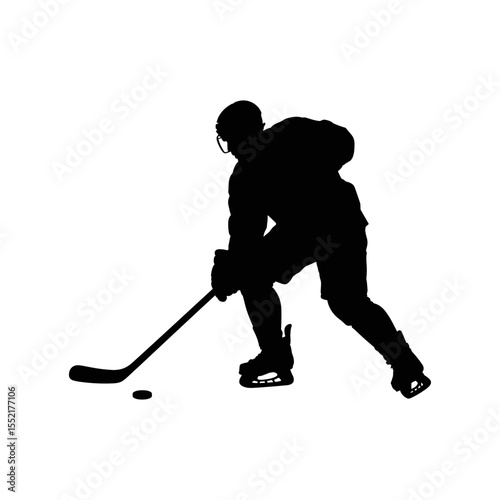 Hockey Player Silhouette: An ice hockey player depicted in a stark silhouette, poised with stick and puck, ready for the game.