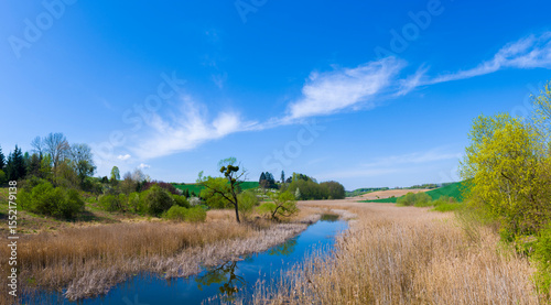 Fototapeta Naklejka Na Ścianę i Meble -  Polish landscape with river and blue sky