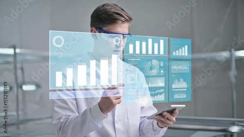 Scientist analyzes data with digital display in modern research lab