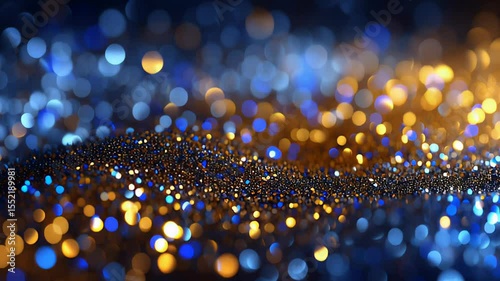 Vibrant bokeh light wave motion in blue and gold. Abstract festive background footage. 