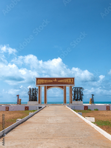 Door of no return in Ouidah, Benin on the Atlantic Coast on a sunny afternoon