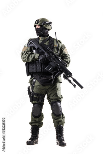 Military special forces soldier fully armed in tactical gear in action