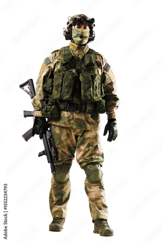 Military soldier in tactical gear holding a weapon against a white background Military soldier in tactical gear holding a weapon against a white background