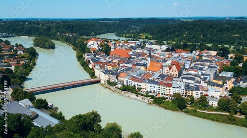 Wasserburg am Inn captured from above, uniquely nestled in a dramatic river bend. This Bavarian town enchants with colorful buildings, medieval charm, and scenic natural surroundings