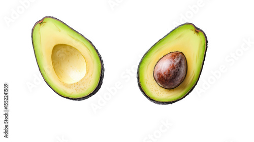 Avocado halves cut open and viewed from overhead
