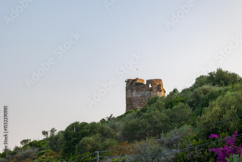 Ruins of ancient Genoese watchtower on hill Corsica