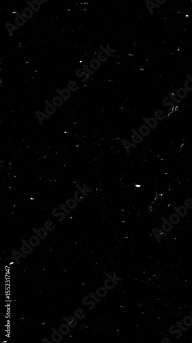 Retro 16mm Old Film Scratch Effect Seamless Vertical Loop Overlay Background.