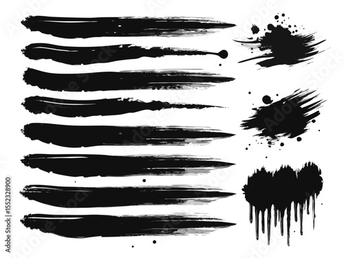 Collection of black ink brush strokes and splatters isolated on white background