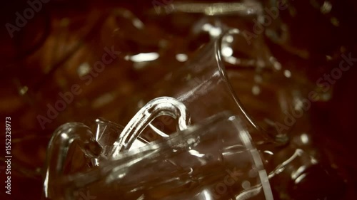 Glass of wine with dramatic red background 