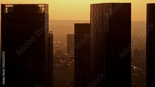Panoramic Sunrise View of Manchester Deansgate Complex Buildings and Urban Skyline at Dawn
