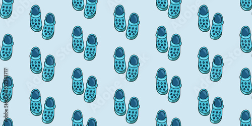 Seamless pattern with blue rubber clogs on pale blue background. Pool footwear. Summer shoes. Cartoon vector background. 