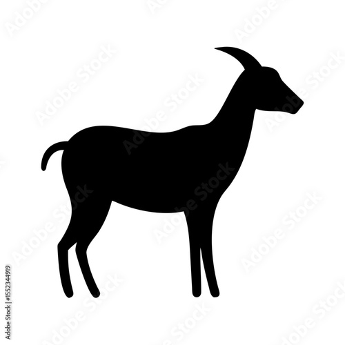 Silhouette of a standing antelope with a single horn and a short tail in profile view isolated on white 100