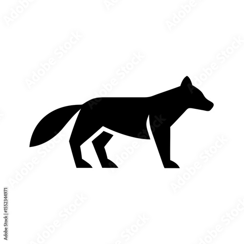 Silhouette of a canine animal standing with a bushy tail and pointed ears in a simple geometric style