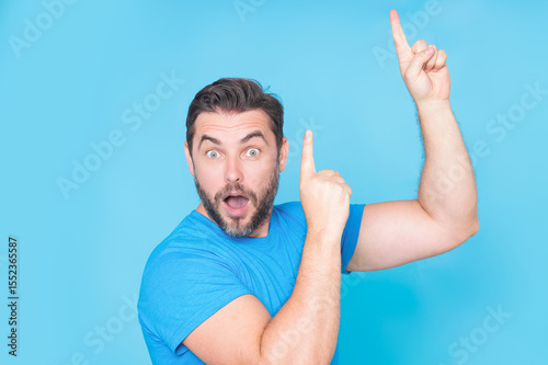 Portrait of excited caucasian man with amazed expression, excited face. Emotion people. Excited man doing winner gesture, smiling and screaming for success. Winning successful and celebrating victory.