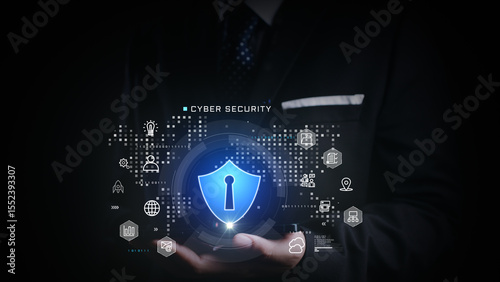Businessman presenting glowing cybersecurity shield surrounded by digital icons, representing secure network, data protection, and digital privacy in a virtual business environment. 3d Rendering