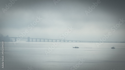 Foggy Bridge and Boat in Minimal Seascape
