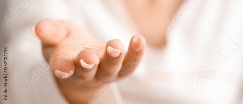 Young woman with contact le...