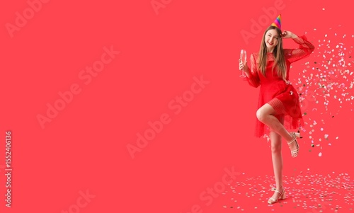 Happy young woman with glas...