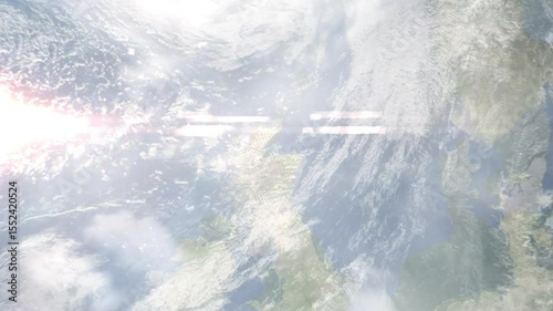 Earth zoom in from space and focus on Elgin, Scotland, Moray, Great Britain. Background for travel intro or blog. Satellite view. 3D style Animation. Images from NASA.