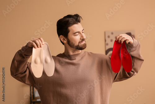 Young man with orthopedic i...