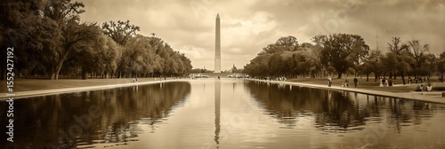 old worn vintage sepia toned polaroid photo of Washington Monument landmark, texture background	