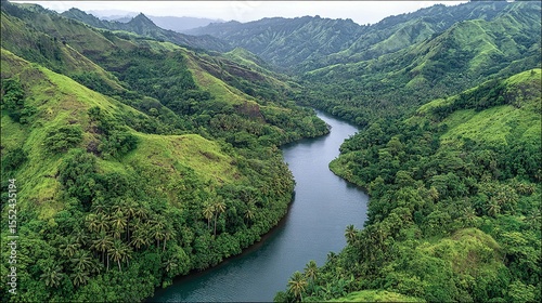 Lush valley with a winding river.