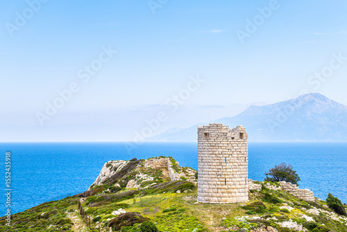 Drakano tower trail aerial view of landscape picturesque Samos island in background on Ikarian Sea Aegean islands at Ikaria island, Greece