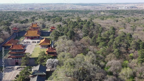 Exploring shenyang qingfuling ancient architecture with aerial views over lush landscapes