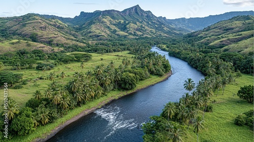 Lush valley with a winding river.