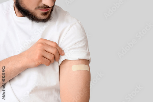 Young man with applied medi...