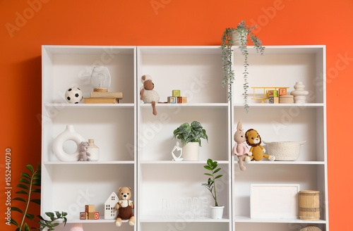 Shelf unit with toys and pl...