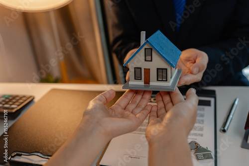 Принти на полотні staff is explaining the information about the house lease contract documents to