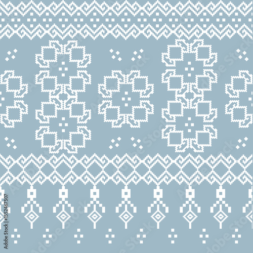 Bring timeless beauty into your creative projects with this elegant pixel floral seamless pattern, inspired by traditional Thai embroidery and cross-stitch textile designs. Soft blue.