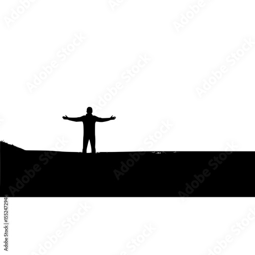 Silhouette of man with arms outstretched on horizon landscape background freedom and success concept image