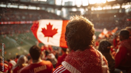 Canada football supporter on stadium. Canadian fans on soccer or hockey pitch watching team play. Group of supporters with flag and national jersey cheering for Canada. Championship game