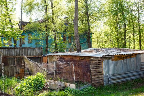 Old sheds cobbled together from various junk on a house territory in a poor area